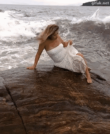 Woman Hit by Huge Ocean Wave