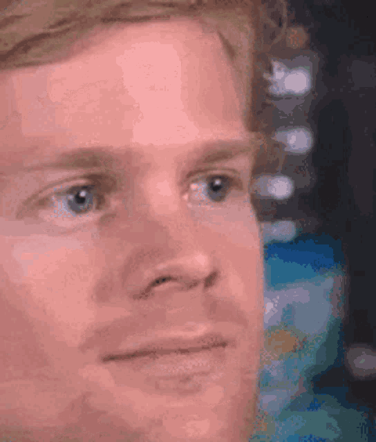 Man Blinking Thoughtfully