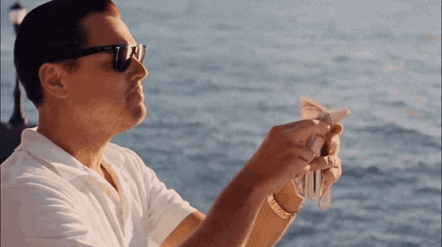 Leonardo DiCaprio Makes It Rain Money