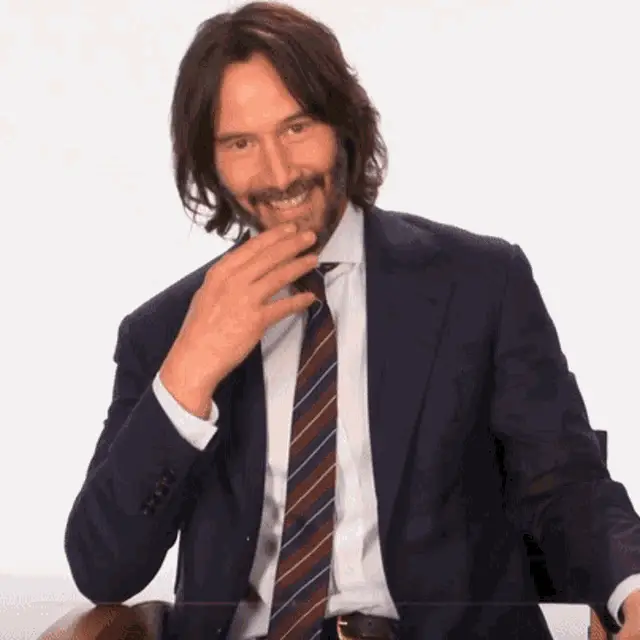 Keanu Reeves Smiles and Gives a Thumbs Up