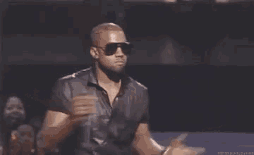 Kanye West Shrugs on Stage