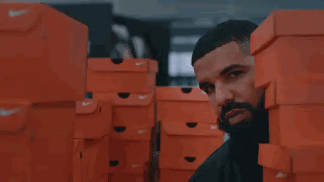 Drake Peeks from Nike Boxes