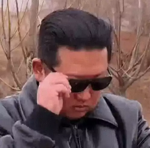 Kim Jong Un Removes Sunglasses