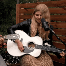 Brynn Elliott Playing Guitar