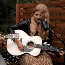 Brynn Elliott Playing Guitar