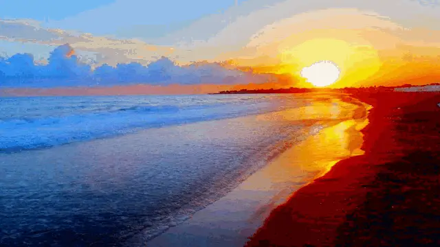Vibrant Sunset Over Ocean Waves