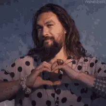 Jason Momoa Makes a Heart Shape with Hands