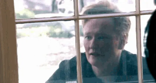 Conan O'Brien Peering Through a Window