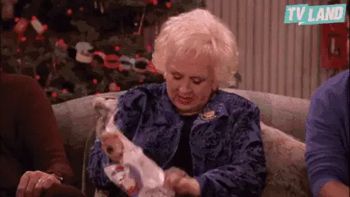 Marie Barone opens a Christmas gift