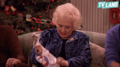 Marie Barone opens a Christmas gift