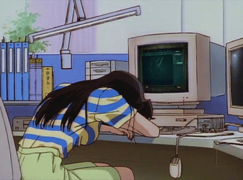 Anime girl sleepig behind her computer