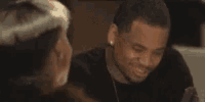 Man and Woman Talking and Smiling