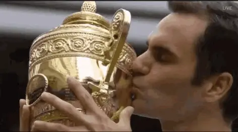 Roger Federer Kisses Wimbledon Trophy