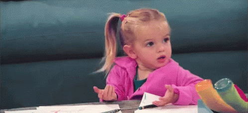 Confused Little Girl Shrugs