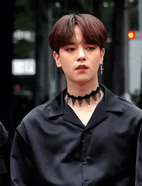 Oneus Member Posing in Black Shirt and Choker