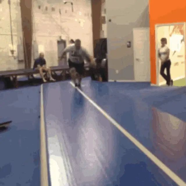 Athletic Backflips on Blue Track