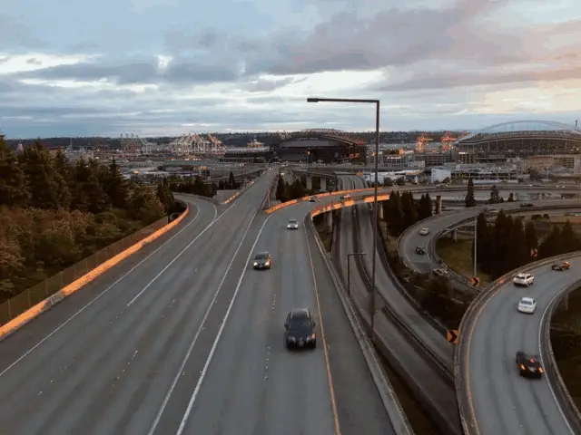 Seattle Skyline with Busy Highway at Dusk