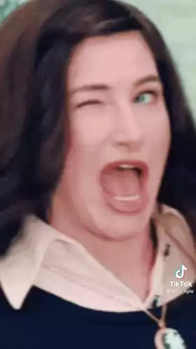 Woman Winks and Makes Funny Face