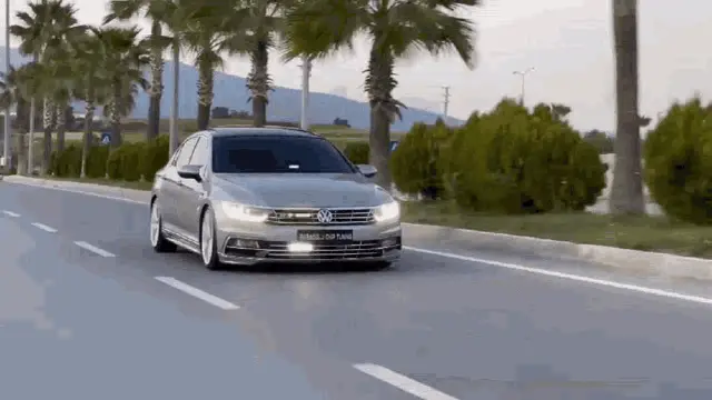 Silver Volkswagen Passat Driving