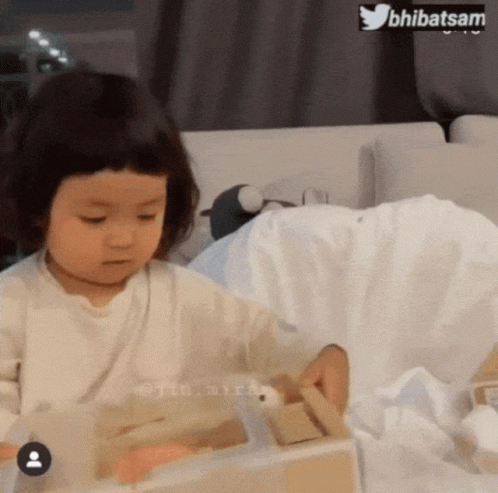 Bhibatsam Cute Kid Unboxes Toys Happily