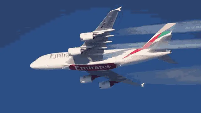 Emirates A380 Soaring Through Blue Sky