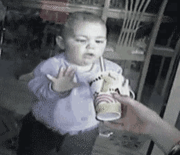 Baby Tries to Drink Shake Through Window