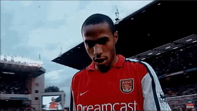 Thierry Henry Winks in Arsenal Jersey