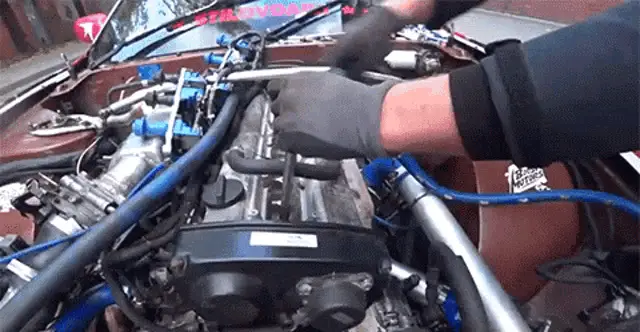 Sergey Stilov Repairs Car Engine