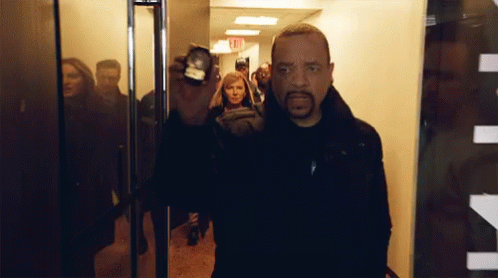 SVU Detectives Entering with Badge