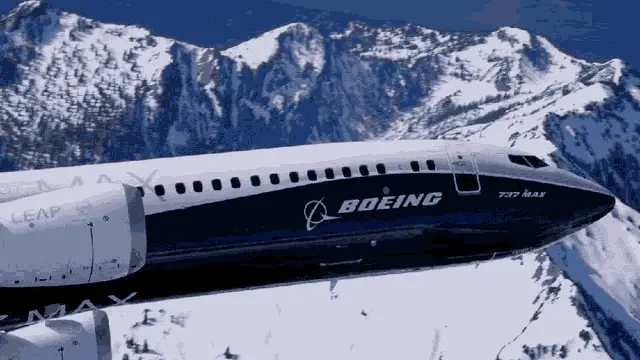 Boeing Airplanes Flying Over Mountains