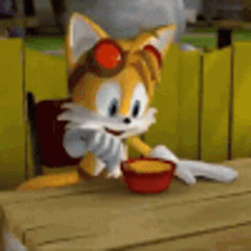 Tails from Sonic Boom trying to eat soup with a fork and laughing
