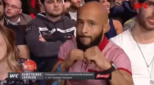 Demetrious Johnson Mimics Punching & Peace Sign