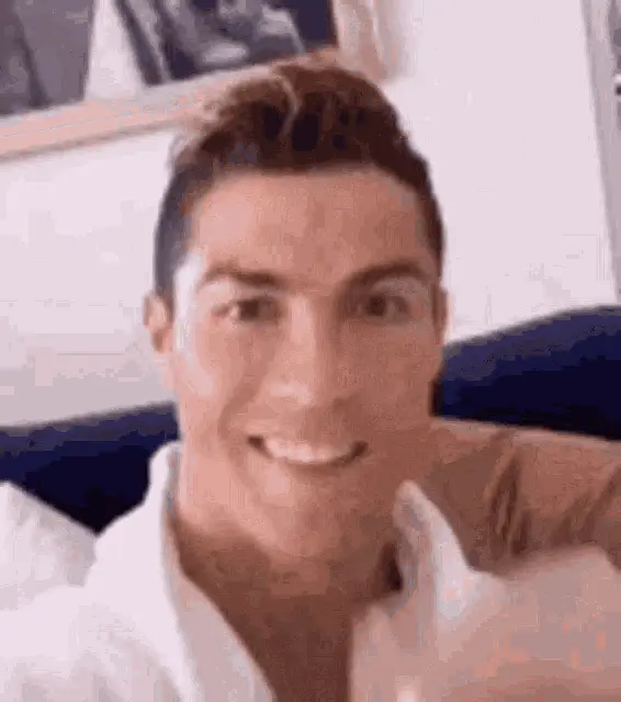 Cristiano Ronaldo Drinking and Smiling