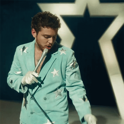 Bazzi Singing in Star-Studded Suit