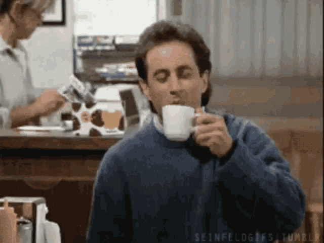 Jerry Seinfeld Sips Coffee at Diner