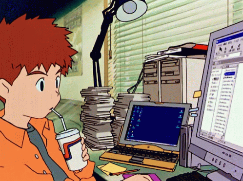 Anime guy using an old computer