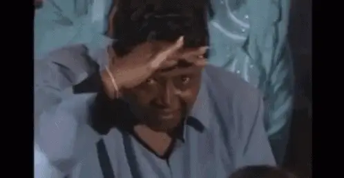 Person Looking Around, Shielding Eyes