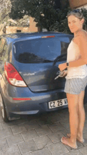 Woman Opens Car Trunk to Reveal Many Cute Puppies