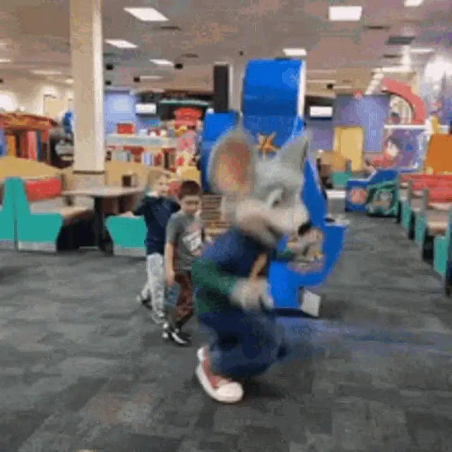 Chuck E. Cheese Mascot Dancing with Kids