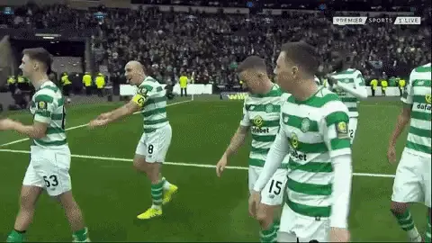Celtic FC Players Celebrate on Field