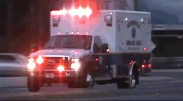 Ambulance Driving with Flashing Lights