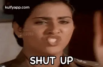 Woman in Police Uniform Says Shut Up