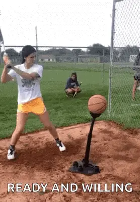 Girl Fails to Hit Basketball with Bat