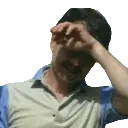 Greg Thompson wipes his brow, feeling hot or tired